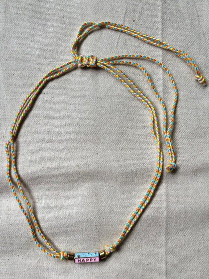 Collier "Happy Mood" – Cordon tressé multicolore & perle message - Manaya Bijoux